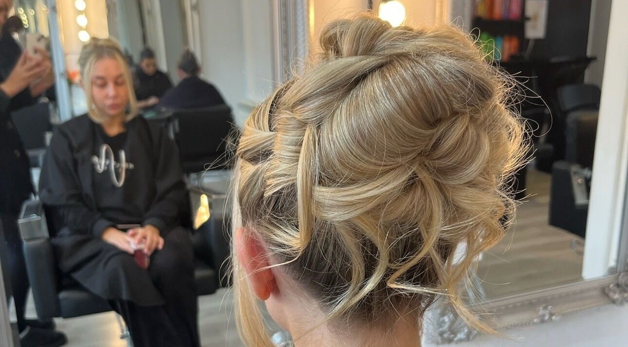 Stylish updo hair design at Eleanor Rose Hair in Accrington, England, GB.