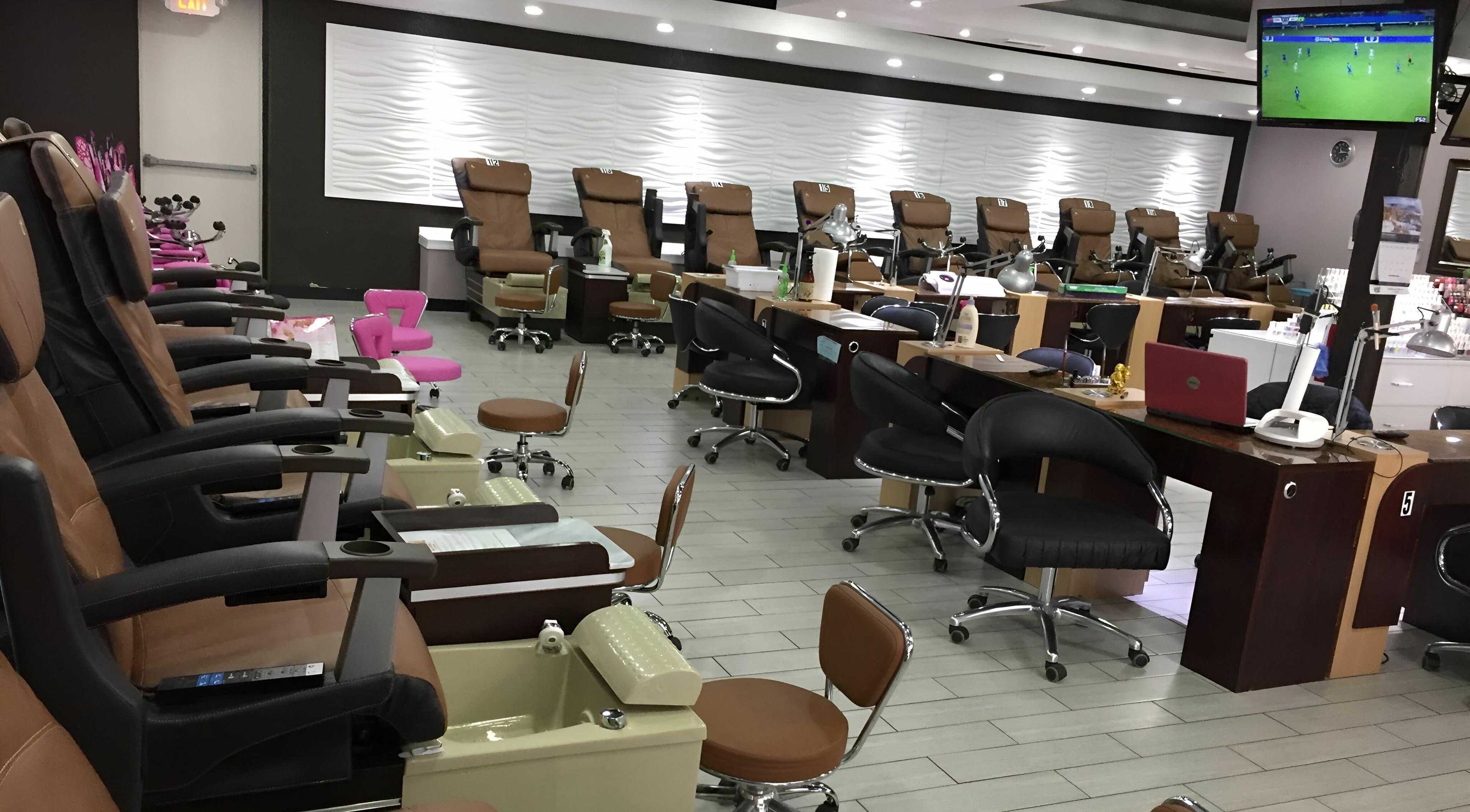 Interior of Rose Nails in Overland Park, Kansas showing luxury nail stations and modern decor.