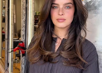 Elegant interior of TOQQA Hair Salon in London, England, GB with stylish haircut showcase.