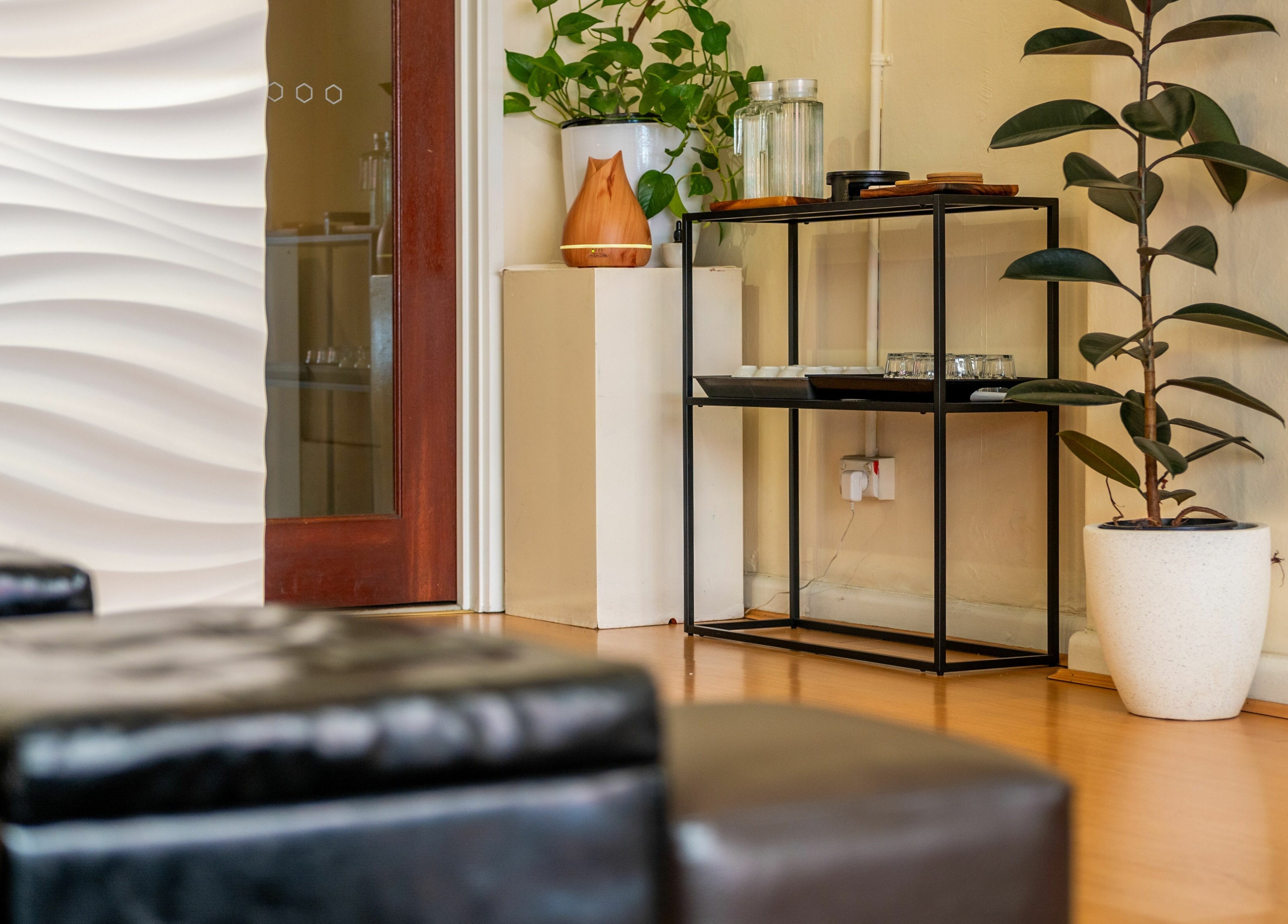 Inviting interior of Prahran - True Thai Massage in Prahran, VIC, AU with plants and stylish decor elements.