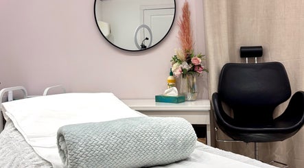 Relaxing treatment room at Gemma Binskin Beauty, Canterbury, England, GB. Cozy setup with chair and decor.