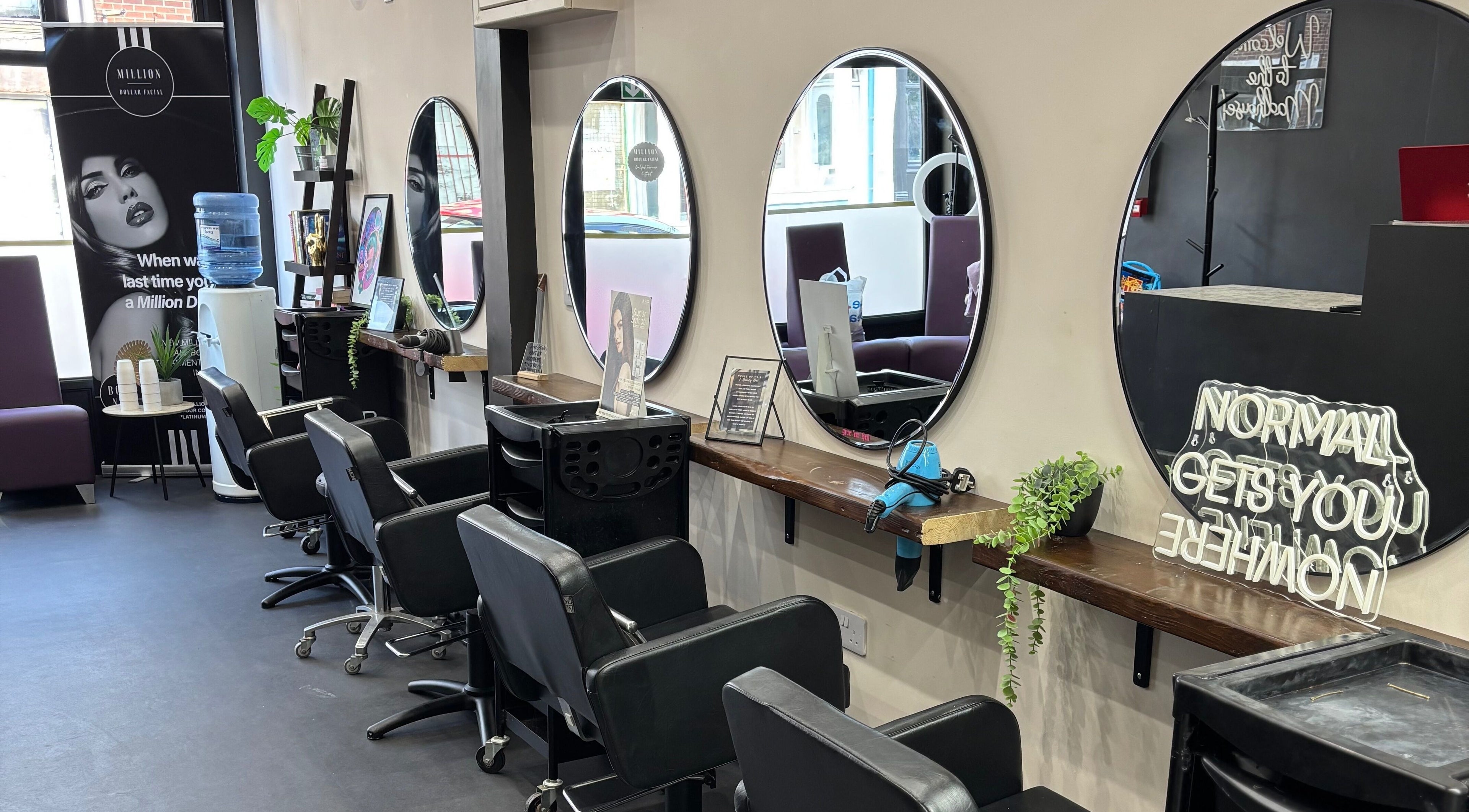 Elegant salon chairs and mirrors at The Solar Skin Club Ramsgate in Ramsgate, England, GB.