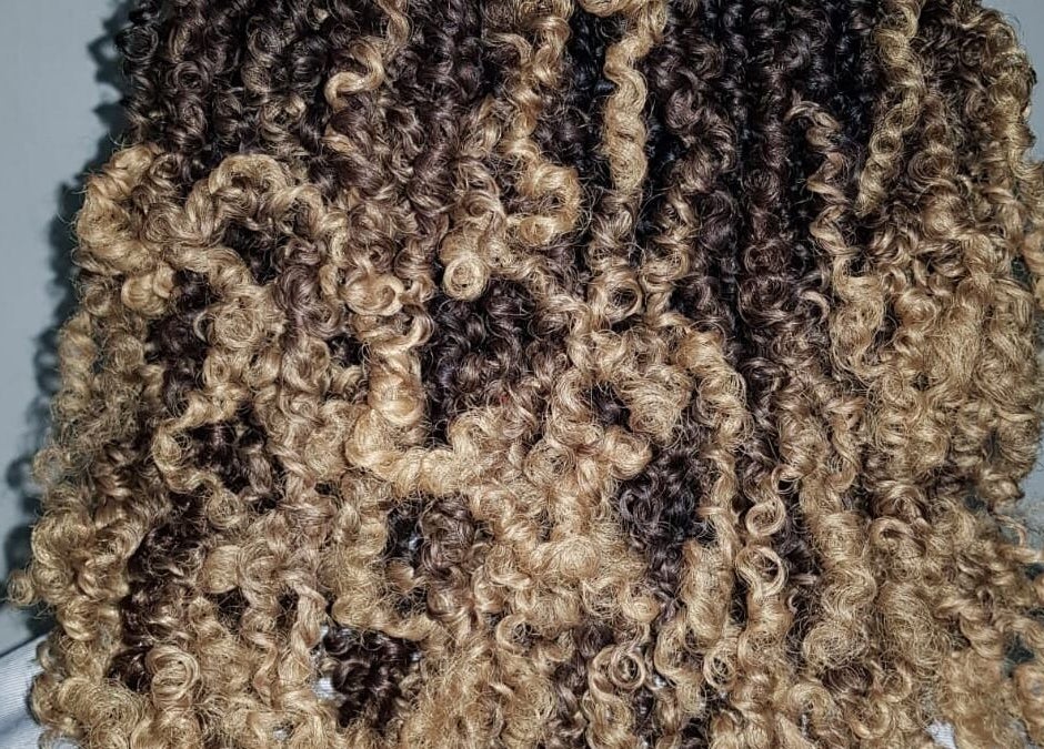 Blonde curly hairstyle detail at Diamond Crochet - Nassau, Bahamas, Nassau, New Providence, BS.