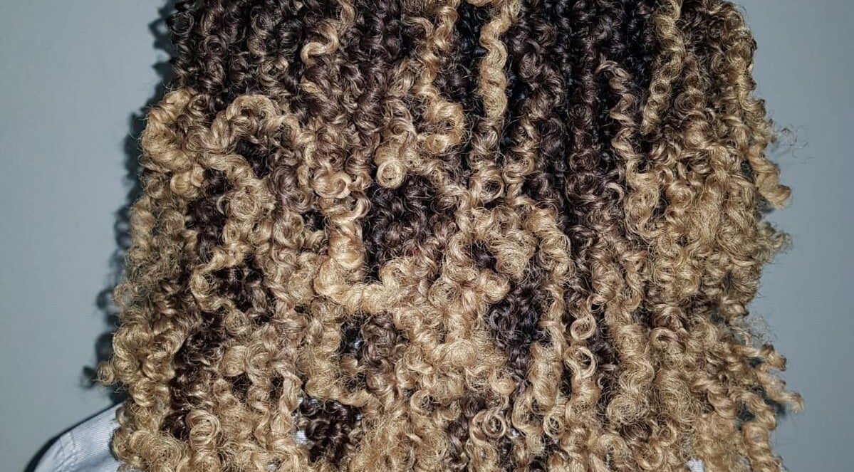 Blonde curly hairstyle detail at Diamond Crochet - Nassau, Bahamas, Nassau, New Providence, BS.