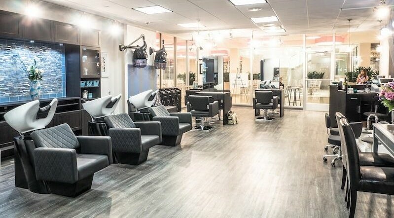 Chic interior of Pretoria Salon & Spa, Philadelphia, Pennsylvania, US featuring stylish chairs and modern decor.