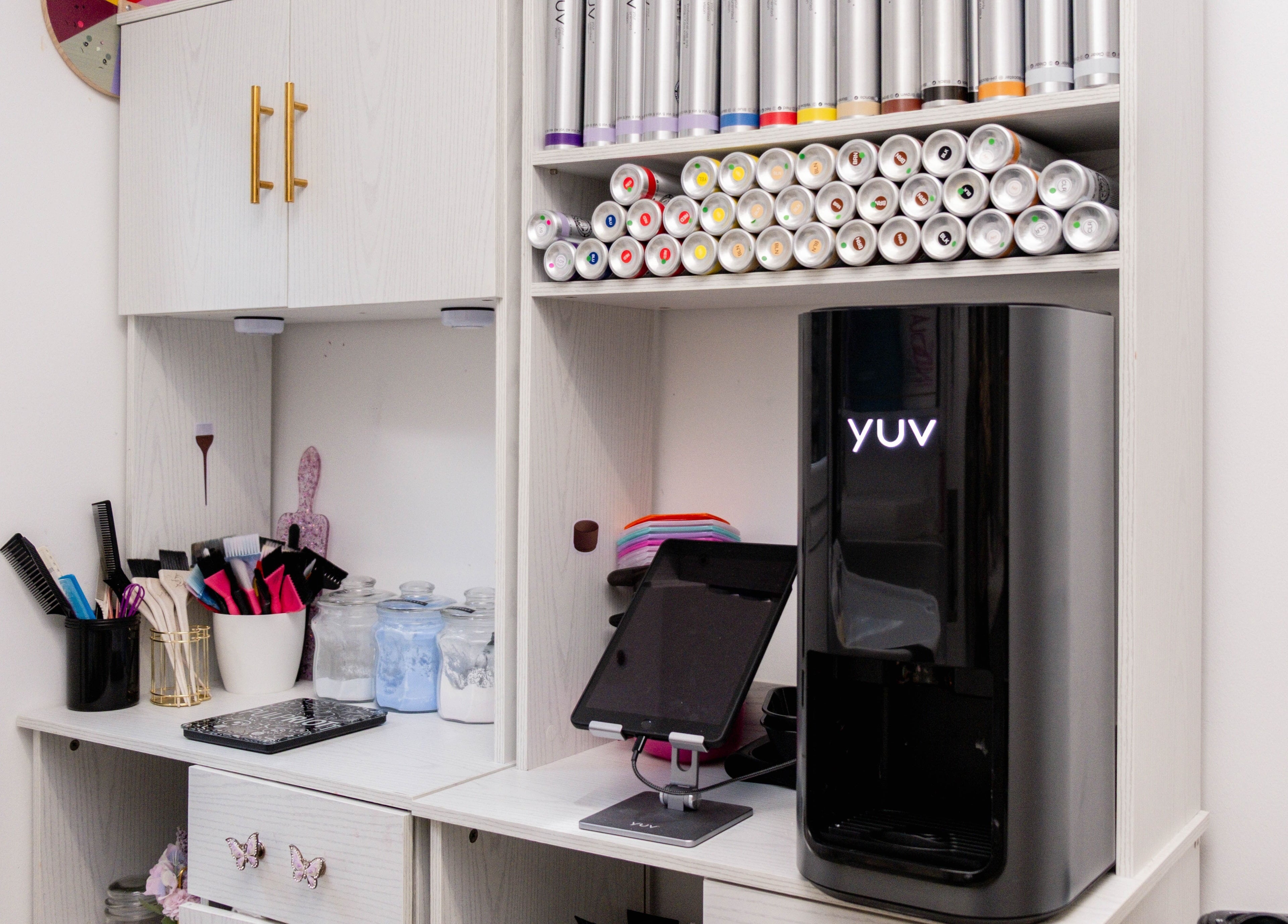 Fededamians - Fhairy Studio's modern salon setup in London, England, GB, featuring sleek tools and vibrant products.