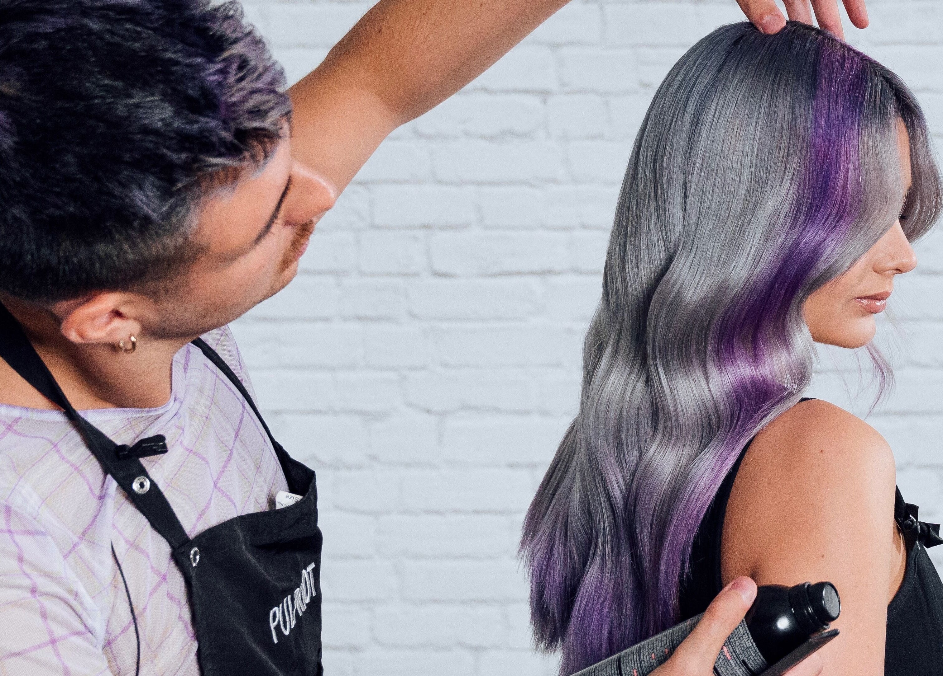 Fededamians - Fhairy Studio stylist in London, England crafting sleek silver and purple hair with care.