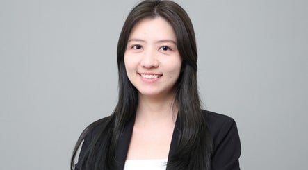 Professional portrait of a smiling individual at Photonow @ Centrepoint, Singapore, enhancing beauty profiles.