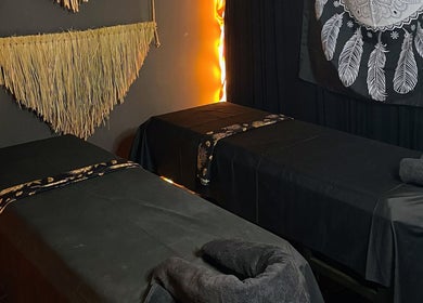 Relaxing massage tables at Inka Spa Bali, Bali, ID with elegant decor setting a calming ambiance.