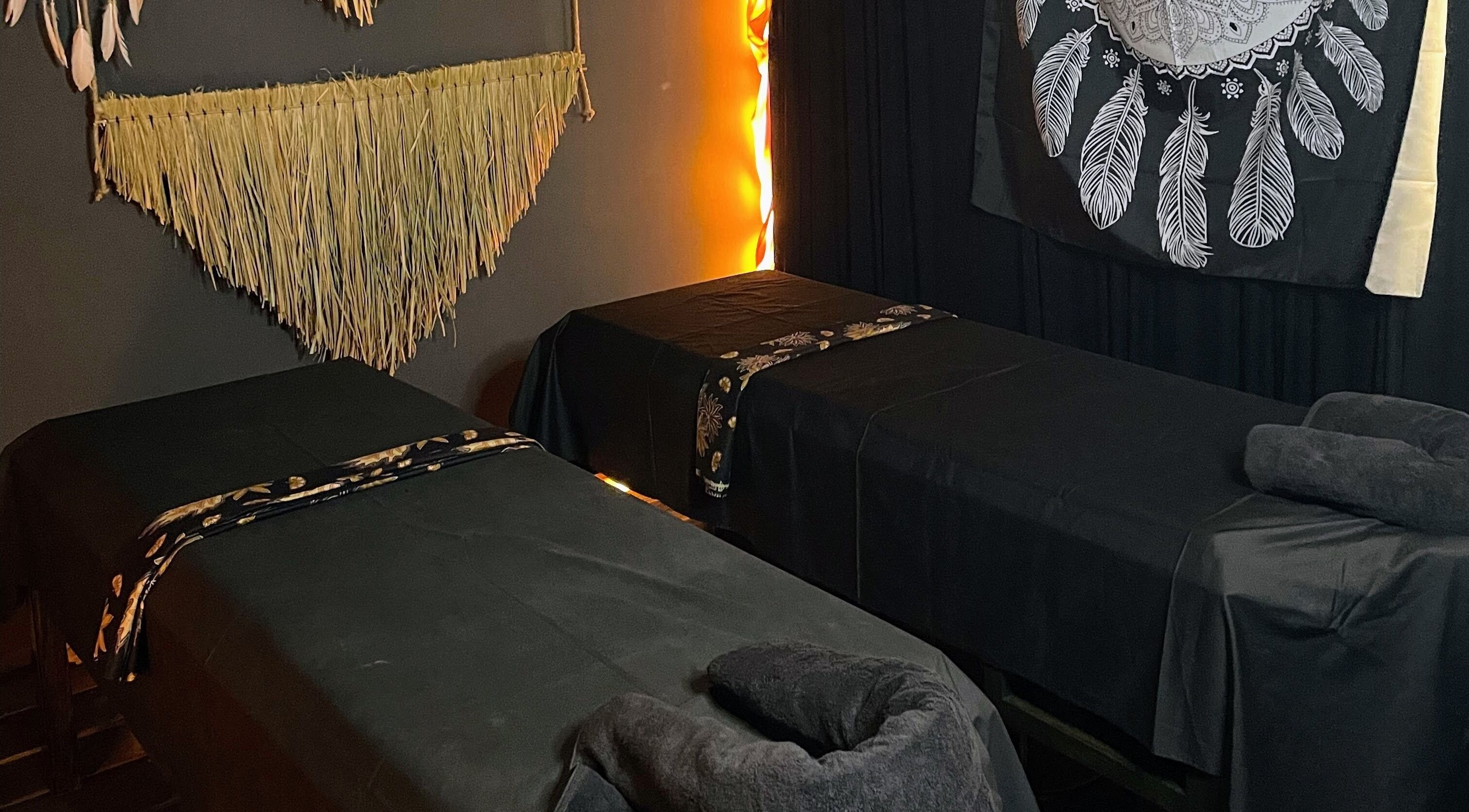 Relaxing massage tables at Inka Spa Bali, Bali, ID with elegant decor setting a calming ambiance.