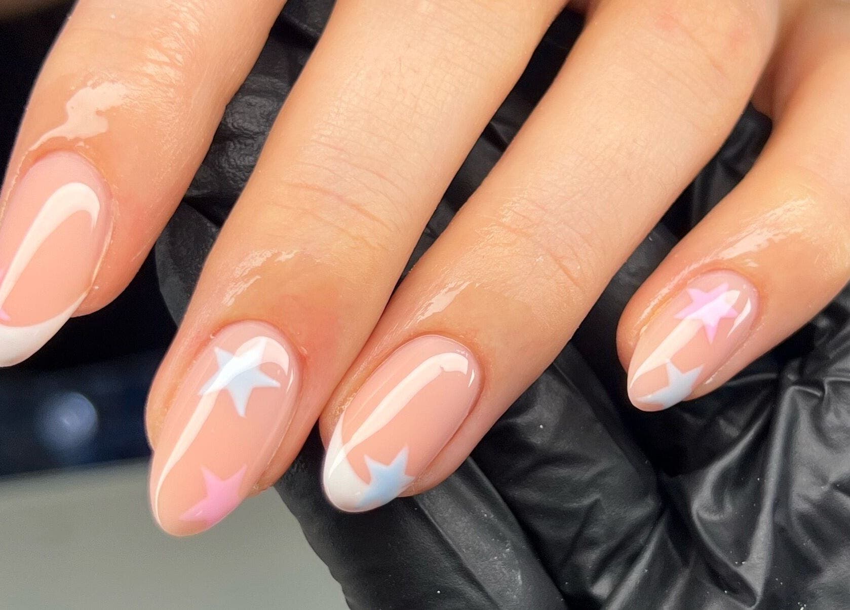 Elegant star-themed nail art at Byleahhm, Osgodby, England, GB. Perfect blend of style and sophistication.