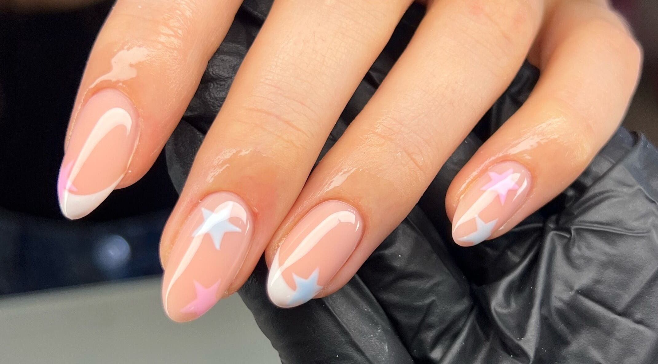 Elegant star-themed nail art at Byleahhm, Osgodby, England, GB. Perfect blend of style and sophistication.