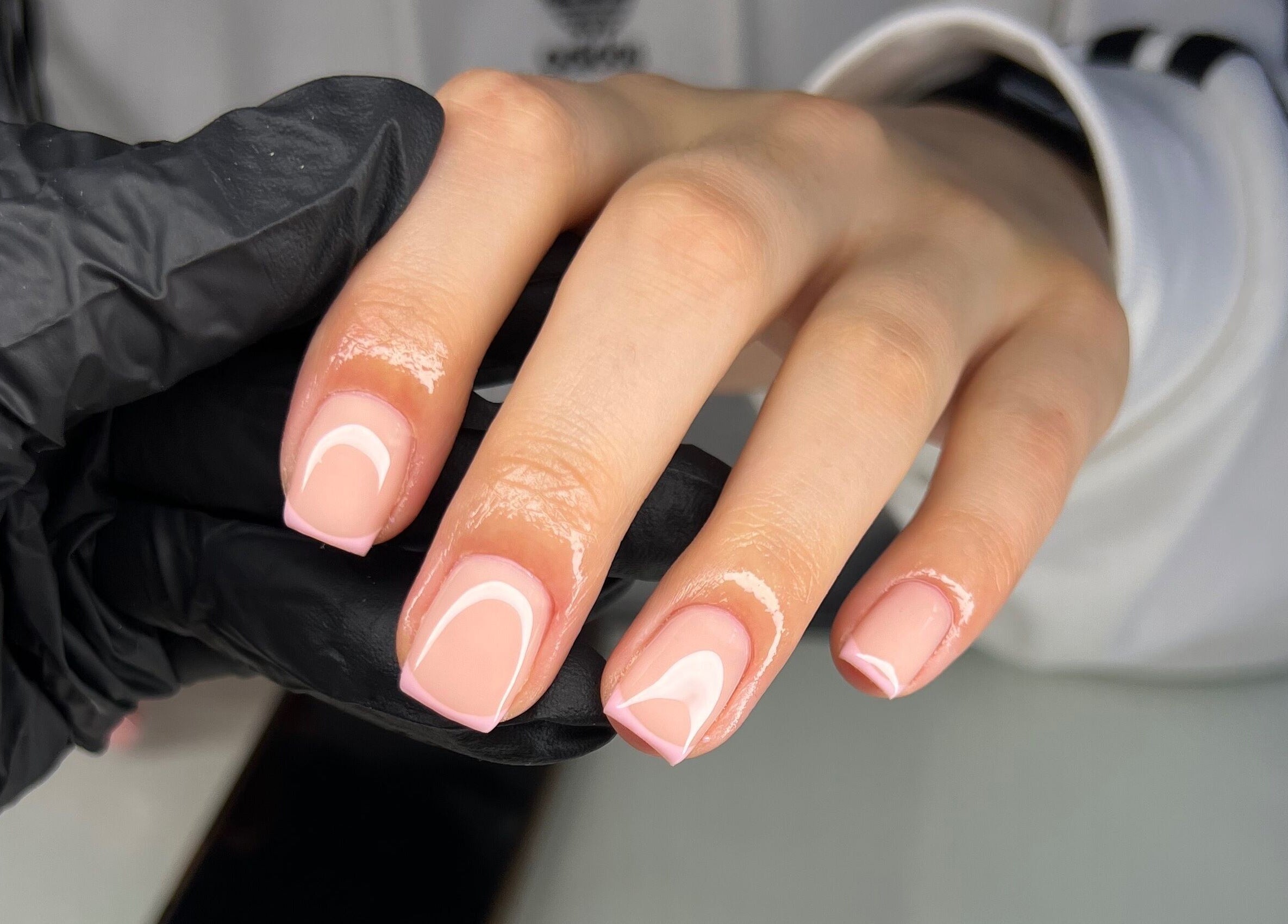 Elegant nail art at Byleahhm, Osgodby, England, GB showcasing a trendy pink design.