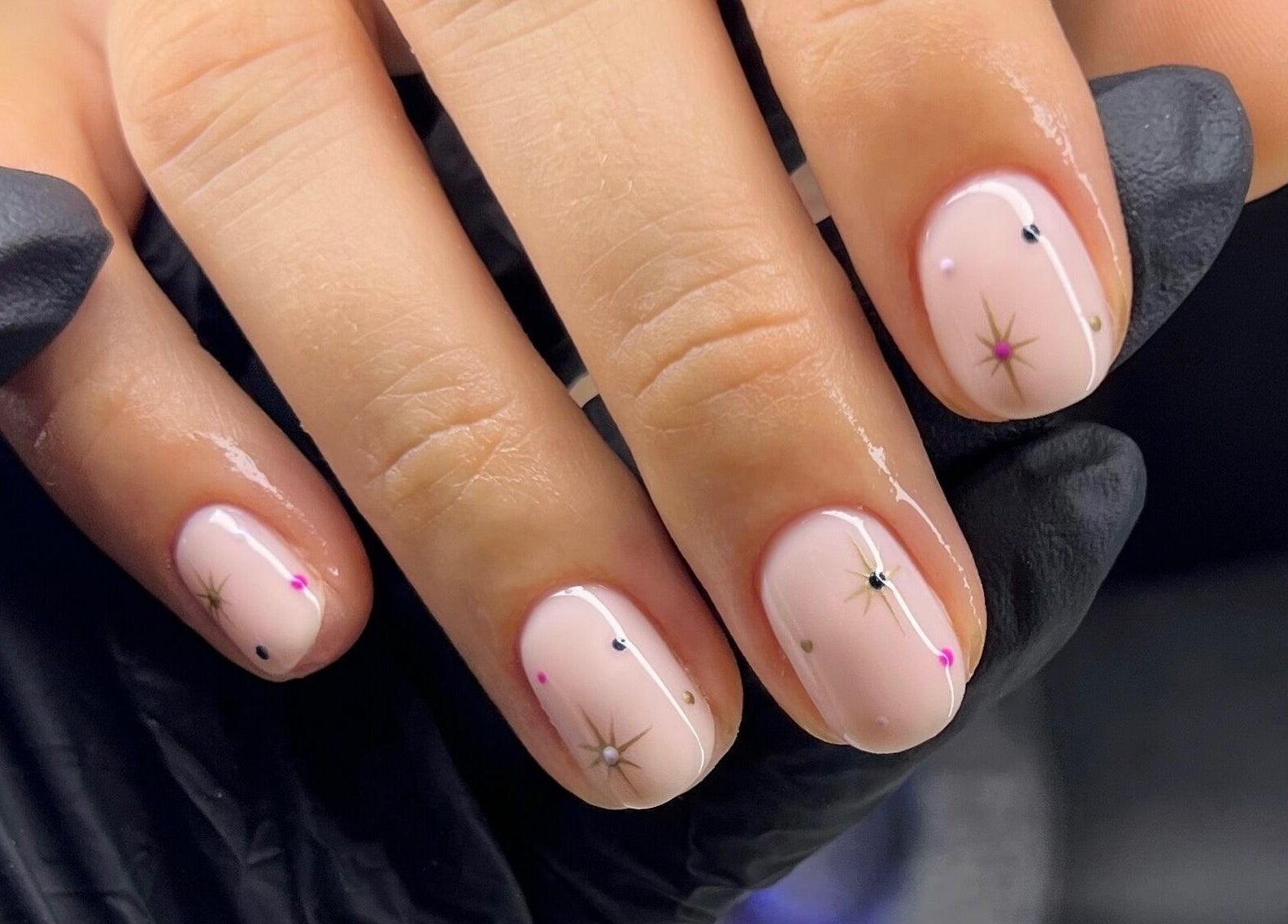 Elegant starry nail art design at Byleahhm, Osgodby, England, GB, showcasing intricate beauty details.