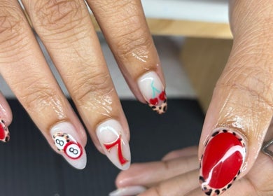 Colorful nail art featuring cherries and numbers at The Lab ltd, London, England, GB. Beautiful manicure design.