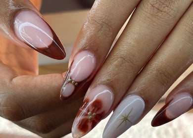 Elegant nail art design at The Lab ltd in London, England, GB featuring intricate patterns and glossy finish.