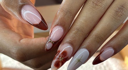 Elegant nail art design at The Lab ltd in London, England, GB featuring intricate patterns and glossy finish.