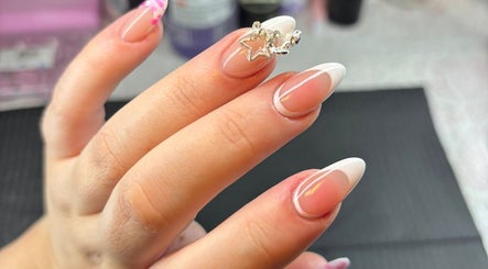 Close-up of elegant nail art with star design at The Lab ltd, London, England, GB.