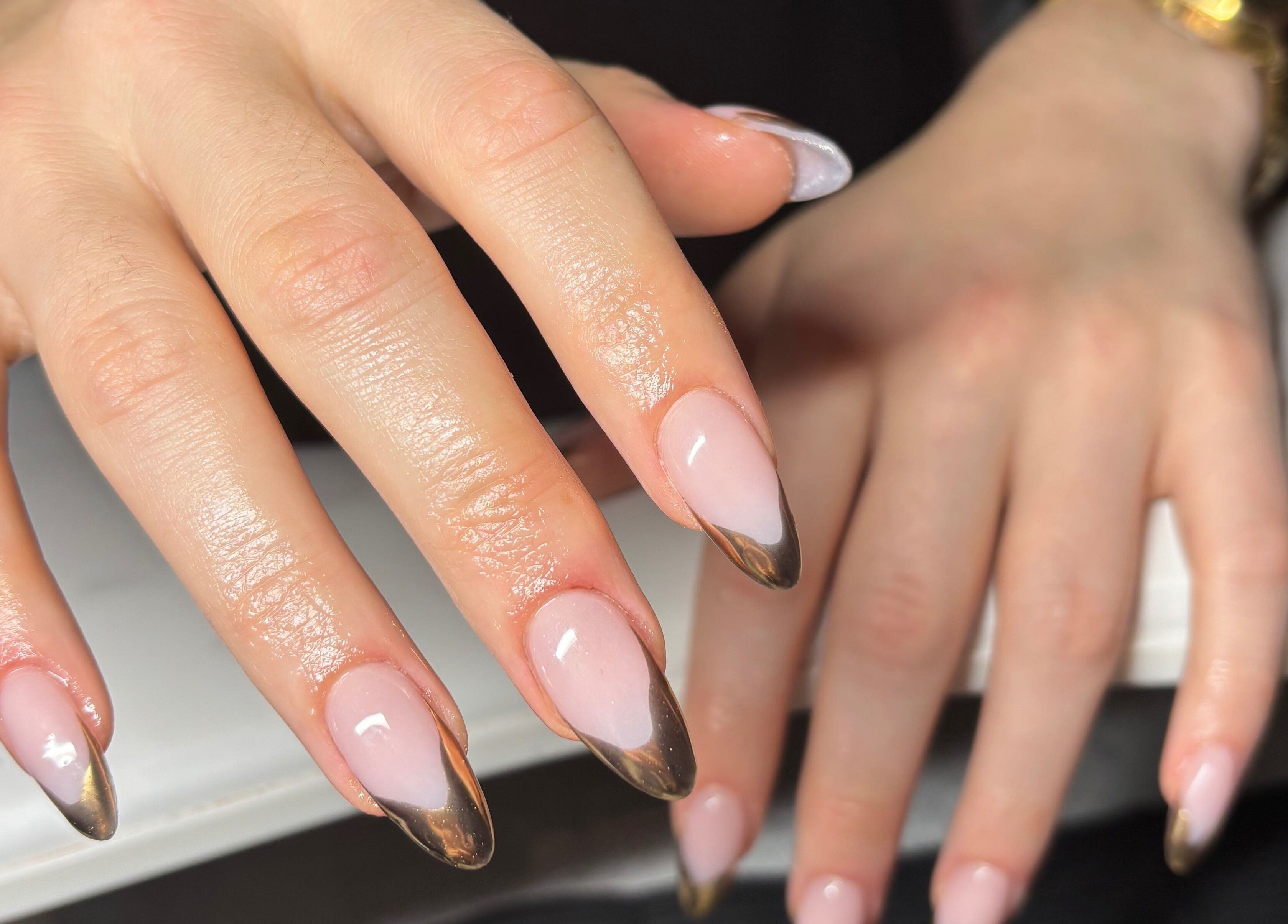 Elegant nail art at The Lab ltd in London, England, GB showcasing polished fingertips with a unique design.