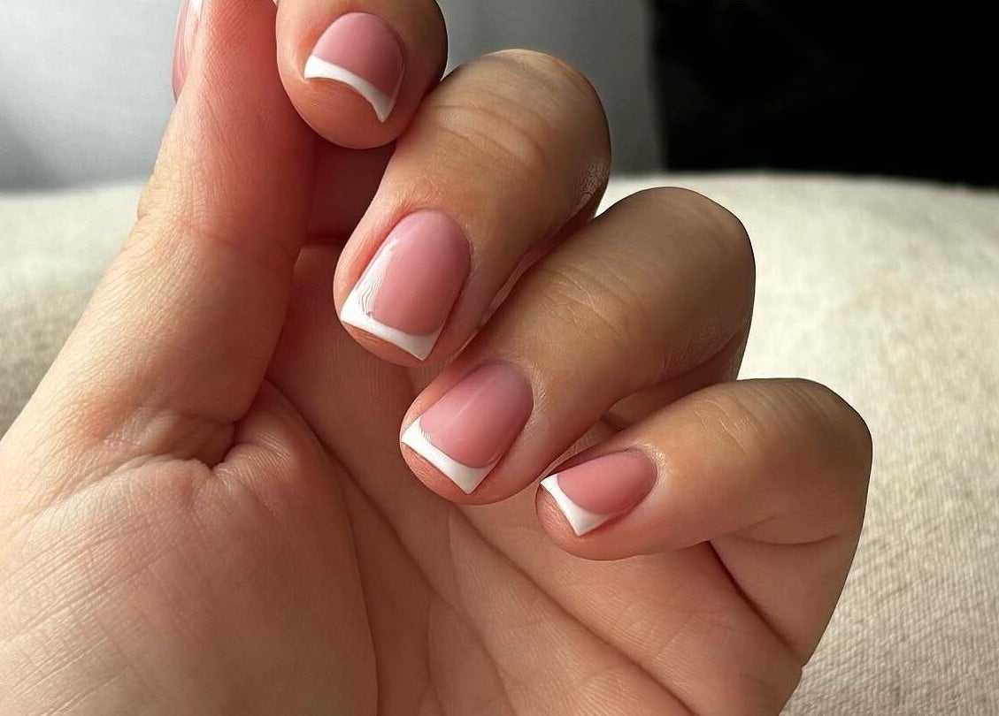 Elegant French manicure at Beauty Haven by Jodie, Caerphilly, Wales, GB, showcasing perfect styling.