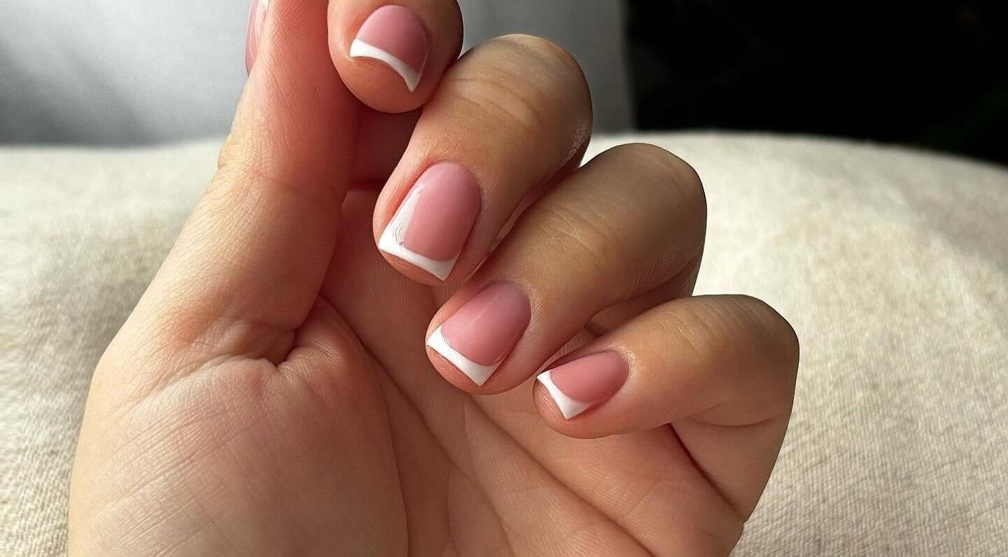 Elegant French manicure at Beauty Haven by Jodie, Caerphilly, Wales, GB, showcasing perfect styling.