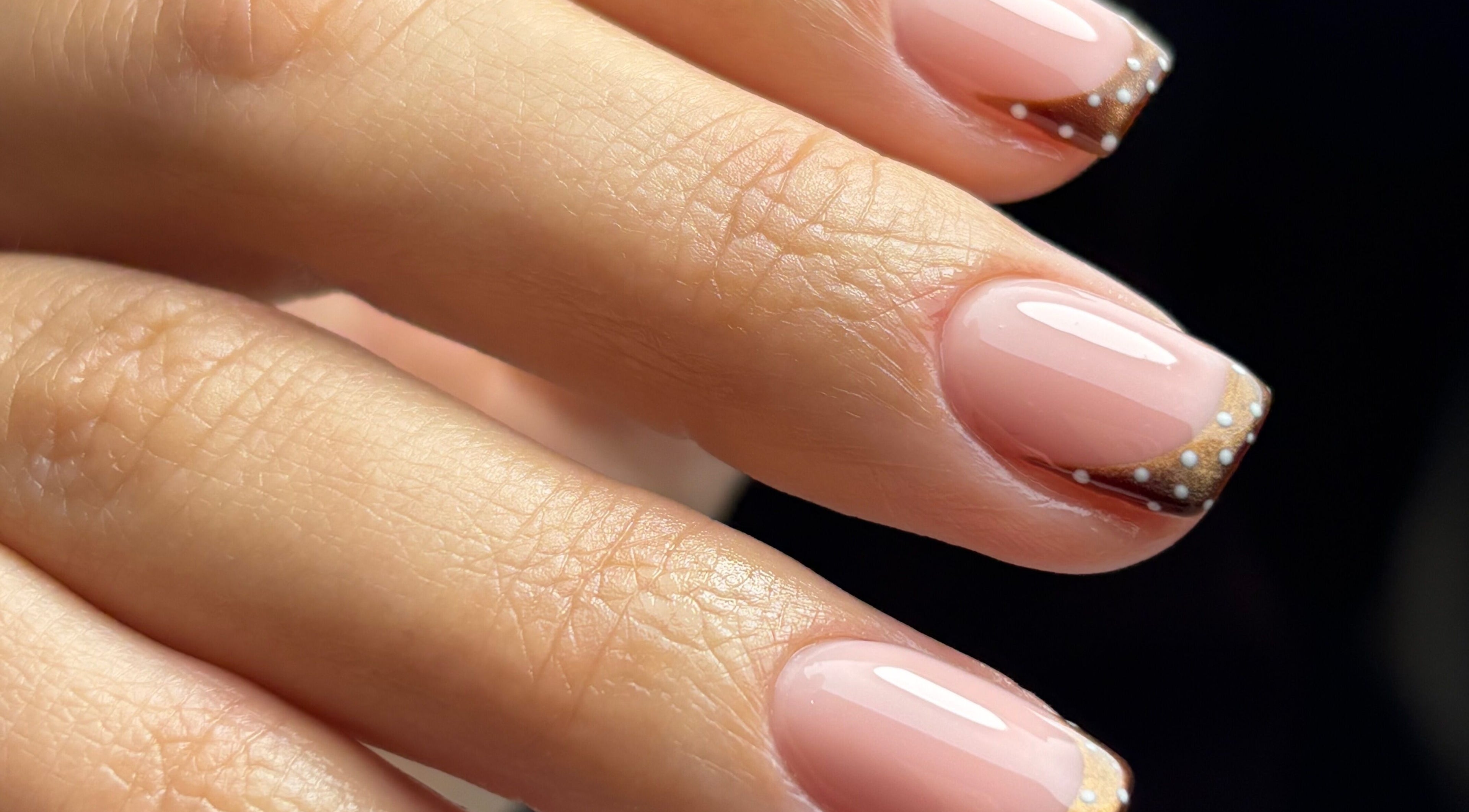 Elegant nail art with brown French tips at Beauty Haven by Jodie, Caerphilly, Wales, GB.