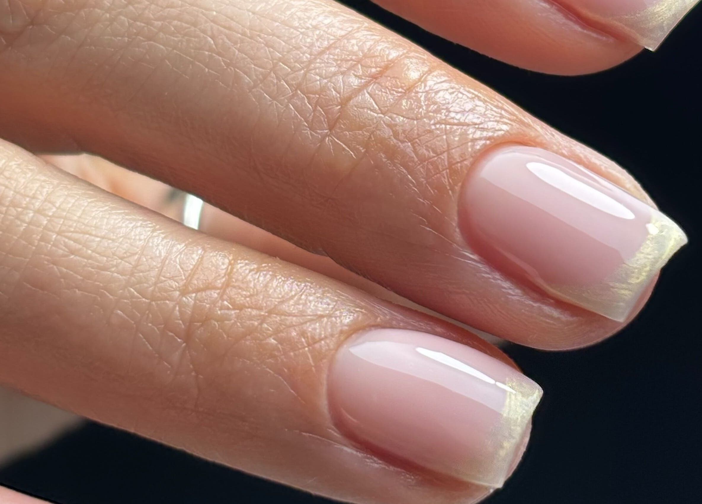 Close-up of a glossy manicure at Beauty Haven by Jodie, Caerphilly, Wales, GB.