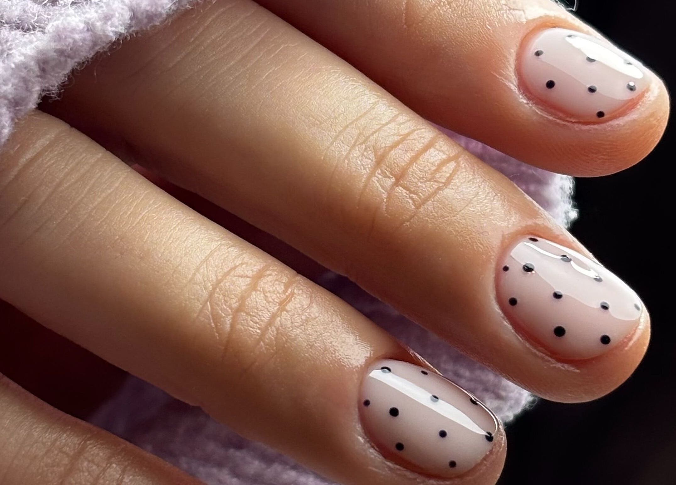 Elegant polka dot nail art at Beauty Haven by Jodie, Caerphilly, Wales, GB.