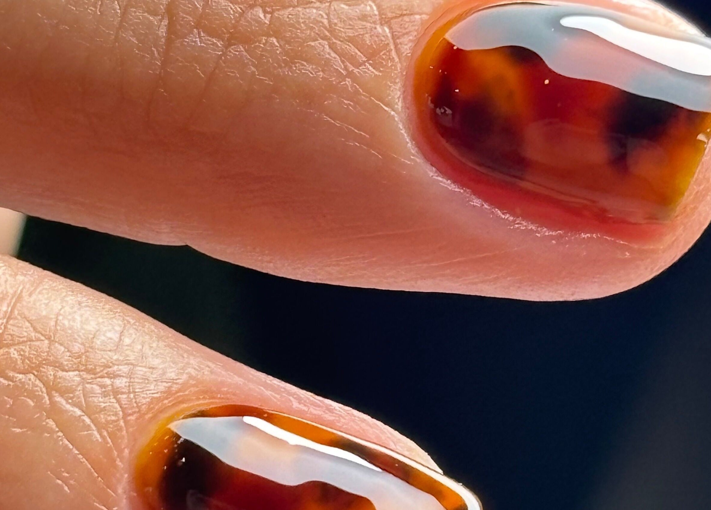 Stylish tortoise shell nail art at Beauty Haven by Jodie in Caerphilly, Wales, GB.