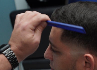 Técnica de corte precisa en Emilio Barber, Humacao, PR.