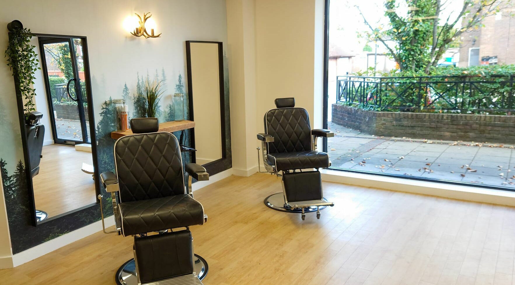 Interior of Grizzly's Male Hair Salon Billingshurst in Horsham, England, GB with sleek barber chairs and decor.