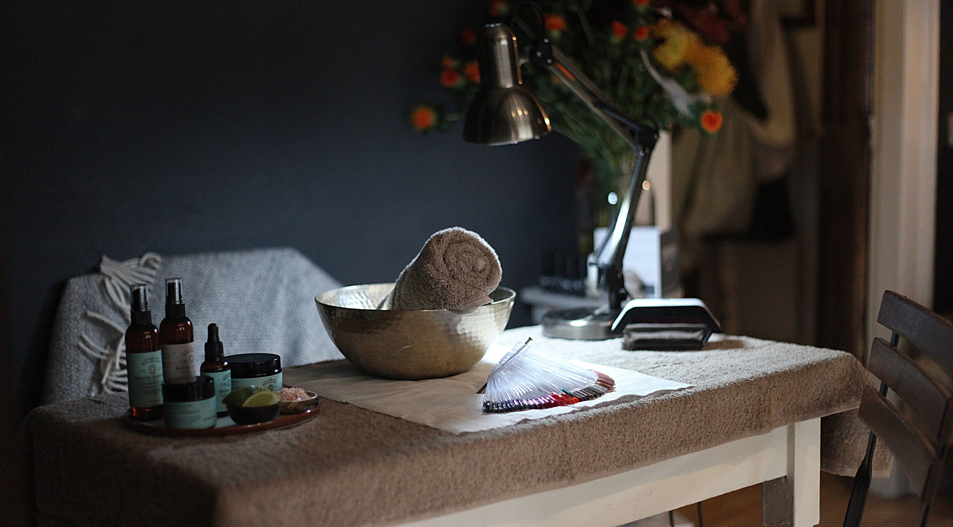 Luxurious spa table with oils and fabrics at Orb Retreat, Uppingham, England, GB. Perfect for relaxation.