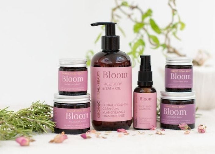 Bloom skincare range at Orb Retreat, Uppingham, England, GB. Luxurious face and body products displayed gracefully.