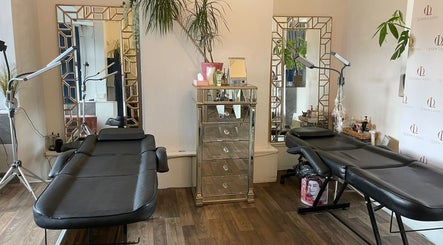Interior of Queen Lashes in Leicester, England, GB showcasing elegant lash treatment beds and decor.