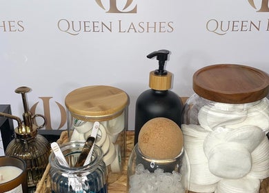 Beauty essentials at Queen Lashes, Leicester, England, GB, featuring jars and pump bottles.
