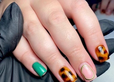 Stylish nail designs at Poise Studio, featuring bold colors and patterns. Rawmarsh, England, GB.