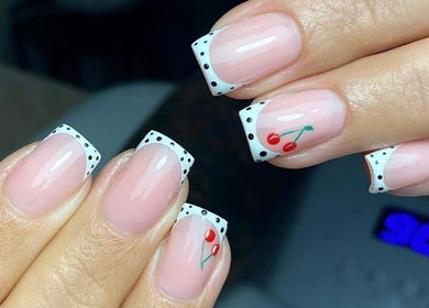 Polka dot and cherry nail art at Poise Studio, Rawmarsh, England, GB, showcasing trendy manicure design.