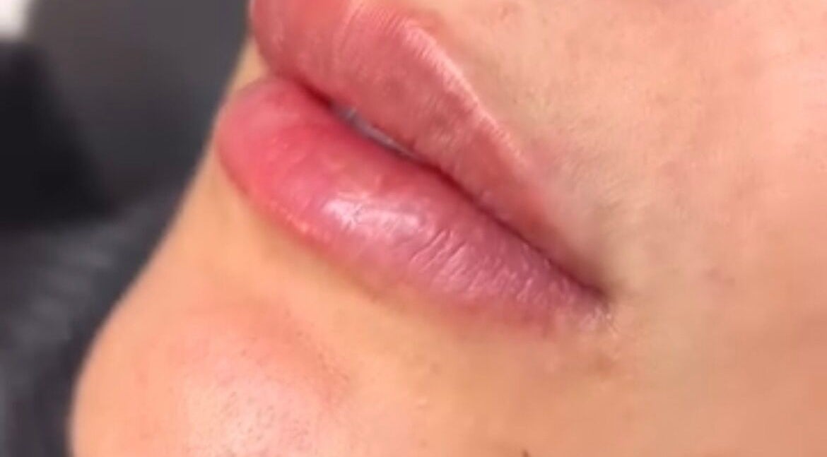 Close-up of glossy, well-treated lips at Poise Studio, Rawmarsh, England, GB.