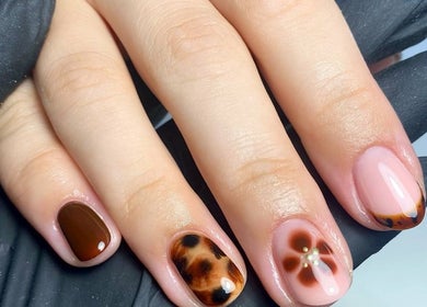 Stylish nail art at Poise Studio, Rawmarsh, England, GB showcasing intricate designs.