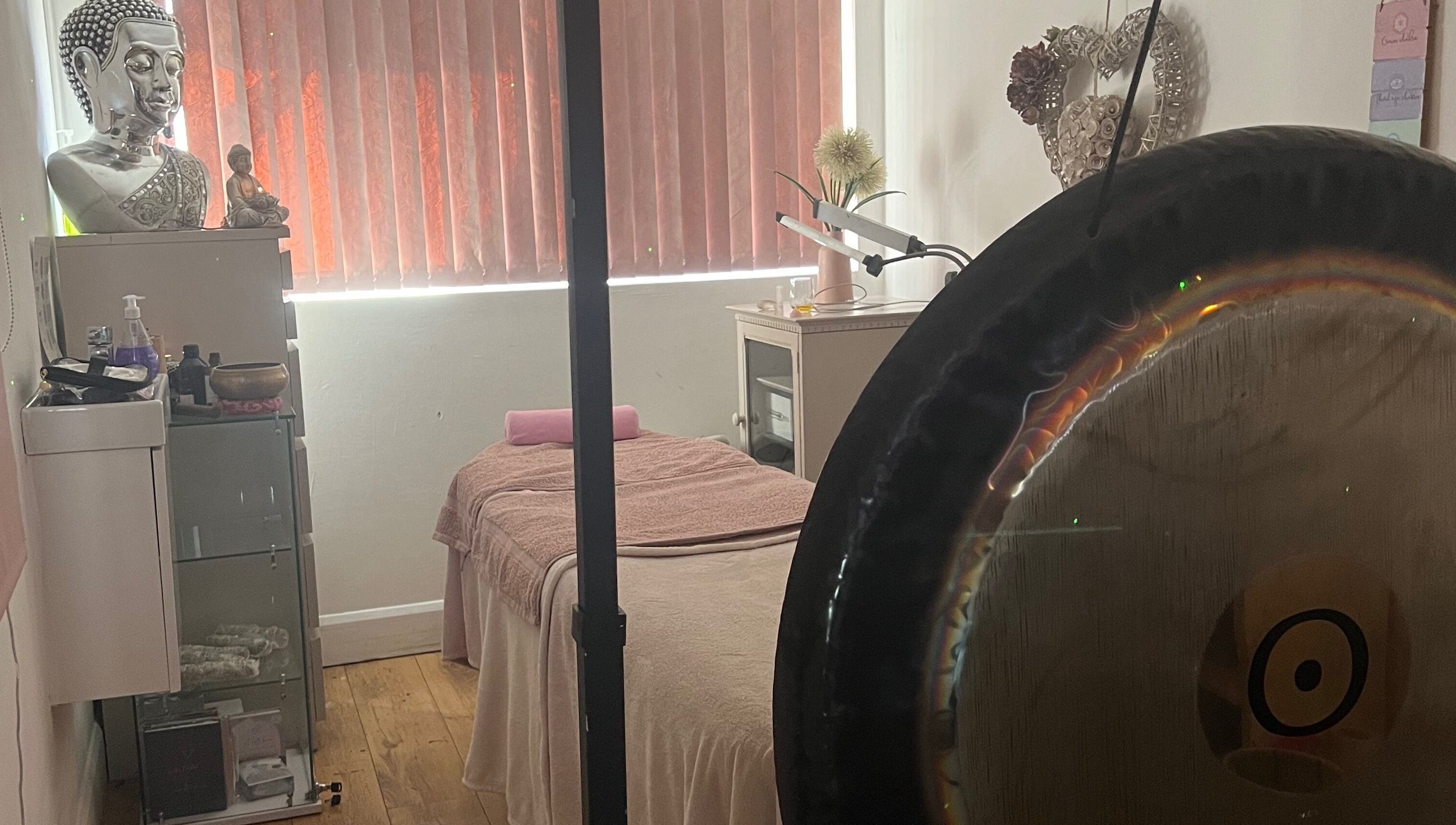 Relaxing massage suite at Eternal by Adriana, Prenton, England, GB with gong and serene decor.