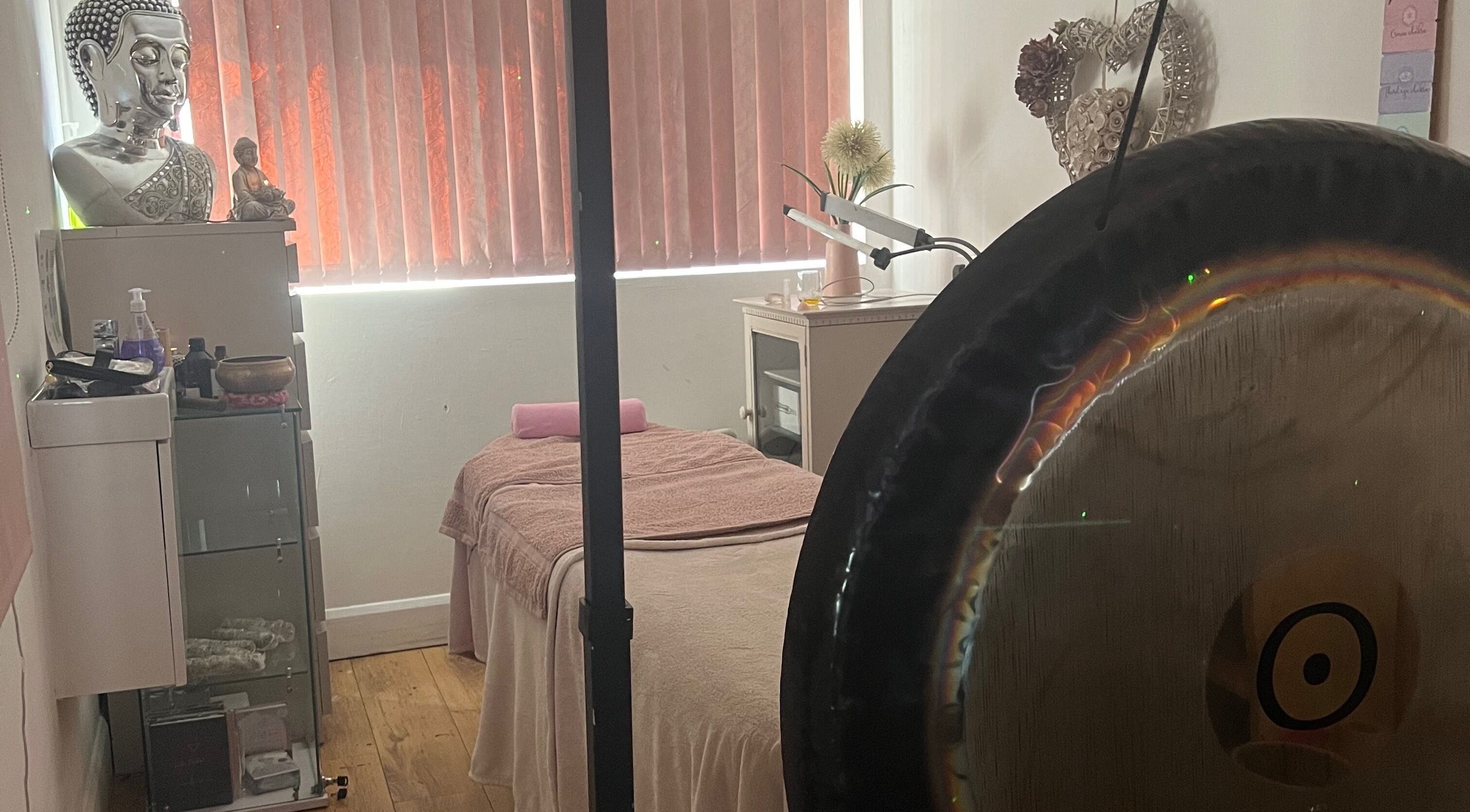 Relaxing massage suite at Eternal by Adriana, Prenton, England, GB with gong and serene decor.