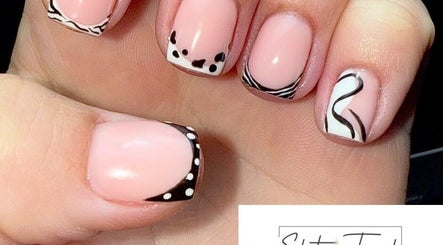 Elegant nail art with black and white designs at Elite Touch, Fleetwood, England, GB.