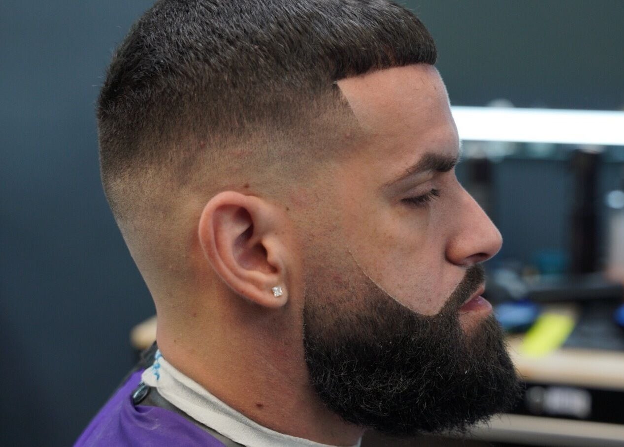 Stylish fade haircut at Polanco Barber in Humacao, Humacao, PR. Sharp grooming and precise styling.
