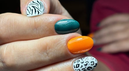 Bold animal print and vibrant nail design at Bombshell Nail Bar 2, Sliema, MT.