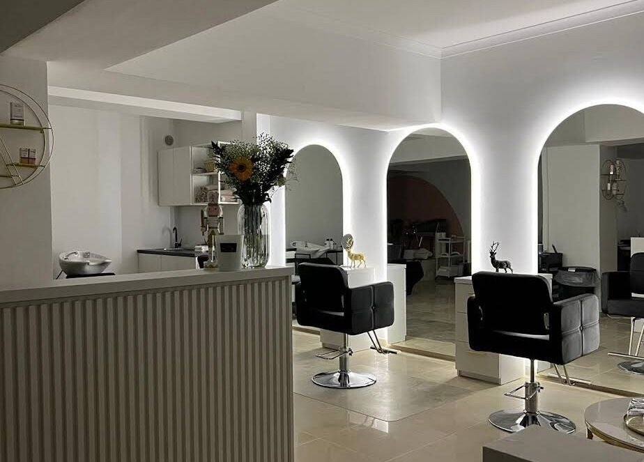 Chic interior of Bombshell Nail, Hair & Beauty Bar Malta located in Tas-sliema, MT with stylish salon chairs.