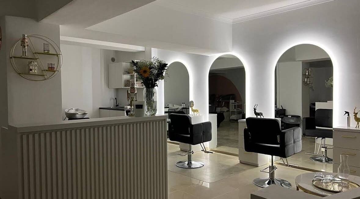 Chic interior of Bombshell Nail, Hair & Beauty Bar Malta located in Tas-sliema, MT with stylish salon chairs.