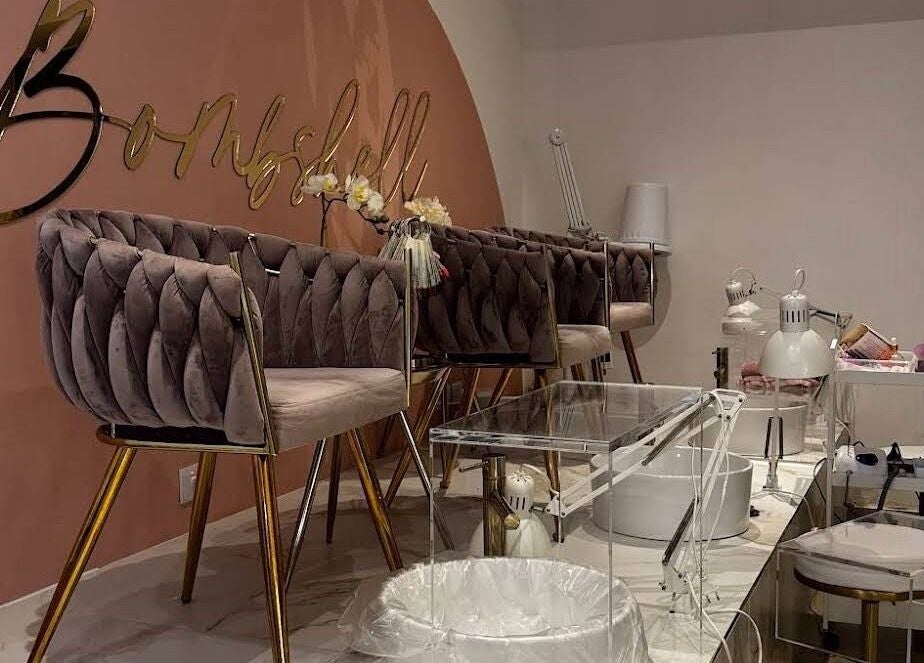 Elegant seating area at Bombshell Nail, Hair & Beauty Bar Malta in Tas-sliema, MT with plush chairs and beauty tools.