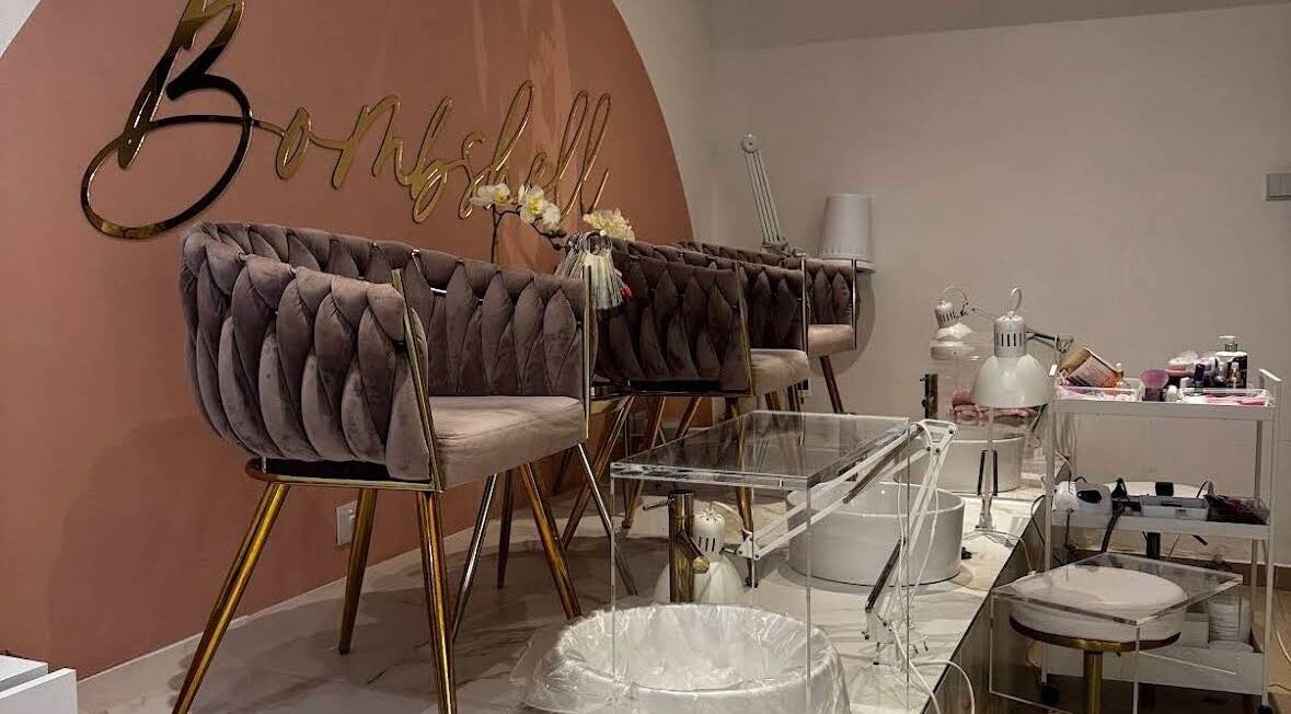 Elegant seating area at Bombshell Nail, Hair & Beauty Bar Malta in Tas-sliema, MT with plush chairs and beauty tools.