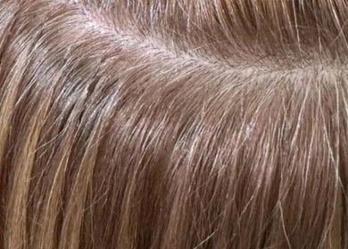 Close-up of glossy hair highlighting professional treatment at Inhype Beauty, London, England, GB.