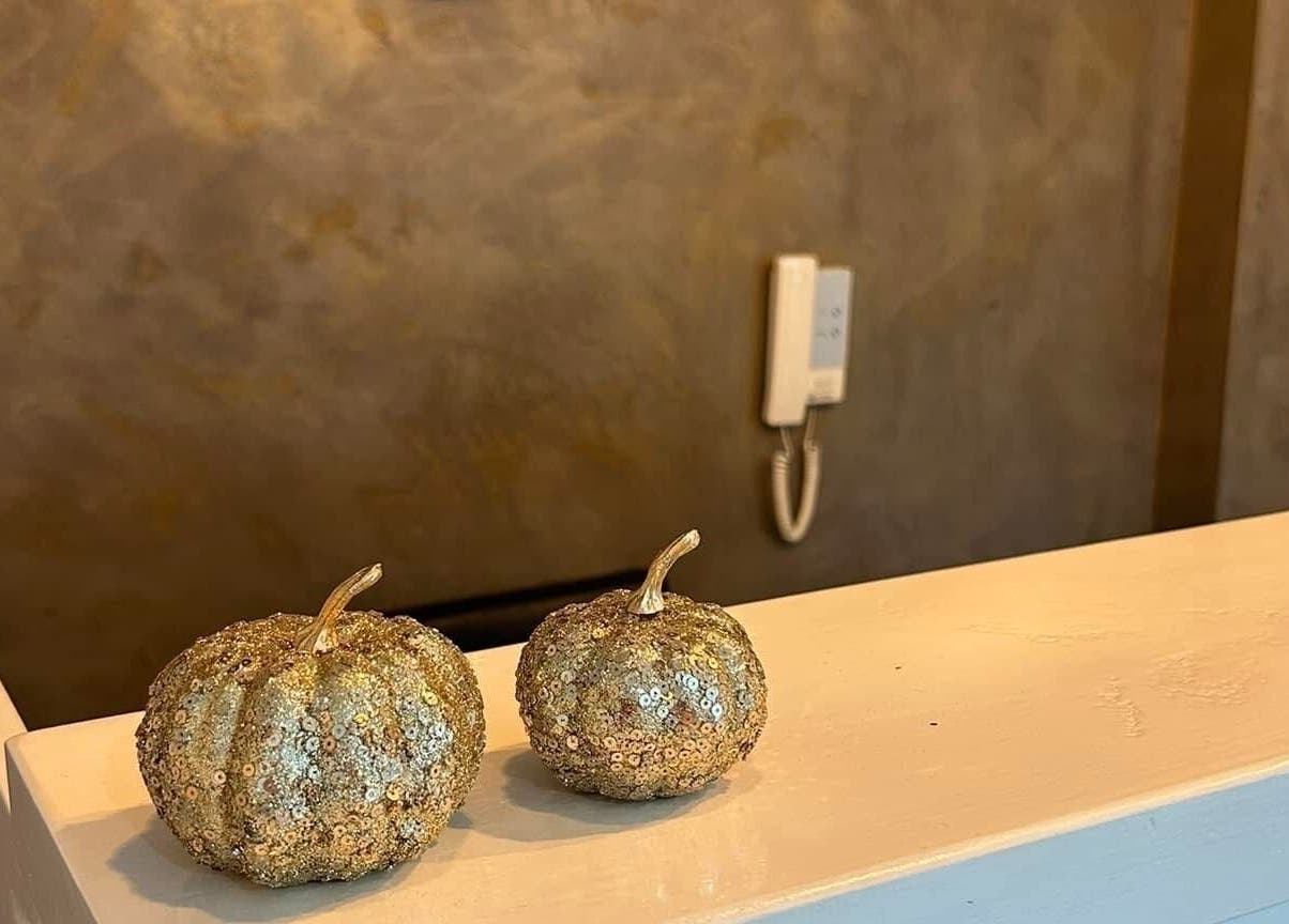 Decorative golden pumpkins at Be Beautiful by Alex, Glenfield, England, GB reception area.
